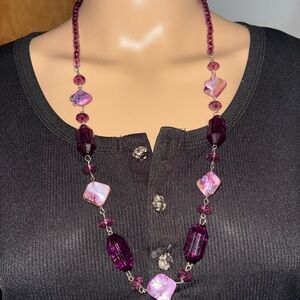 Gorgeous purple beaded necklace with faceted glass and mother-of-pearl beads.